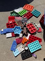 Group shot of all molds and liners spread on ground