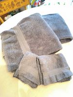 All three gray towels stacked together