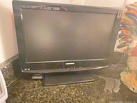 Front view of Magnavox 19" LCD TV on stand