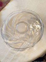 Full view of clear etched glass cake plate top