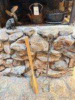 Overall view of all fireplace accessories on hearth