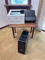 Overall view of printer, scanner on table, tower below