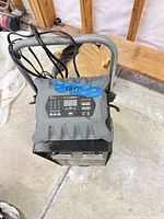 Top view showing Pro-Logix charger accessory on handle