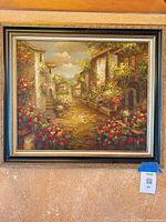 Full view of framed oil painting on wall