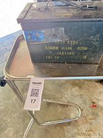 Ammo can on chrome rolling stand, overall view