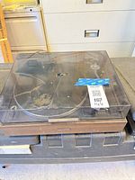 Top view of Pioneer turntable with cracked dust cover