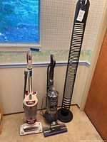 All items: Shark vacuum, Dyson vacuum with motorhead, tower fan lamp