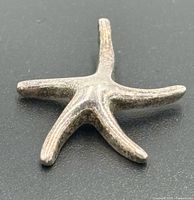 Front view of sterling silver starfish pendant