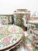Group shot showing teapot, sugar pot, plates, waste bowl, cup and saucer