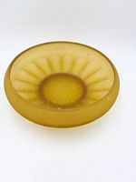 Top view showing complete bowl, color, and sunburst pattern