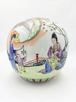 Front view of porcelain ginger jar with painted garden scene