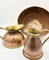 Copper bowl and two pitchers front view