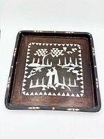 Full view of tray showing inlay scene and border