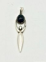 Front view of sterling silver goddess pendant showing cabochon and bail
