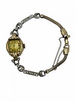 Front view of Bulova ladies cocktail watch showing dial, diamond links, full bracelet