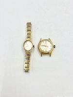 Front view of both watches showing dials and bracelet