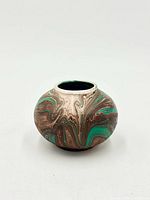 Front view of marbled Garden of the Gods bud vase