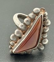 Front view of ring showing triangular carnelian and beaded bezel
