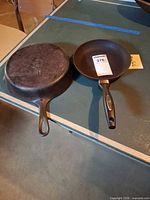 Both skillets top view on table