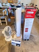 Tower fan, table fan, iron box grouped