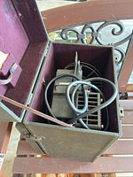 Projector inside carry case showing power cord and interior lining