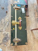Top view showing full trunk, hardware, leather strap, overall condition
