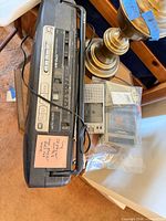 Sony CFD boombox next to bagged Realistic recorders