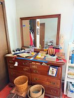 Front view of dresser with mirror attached, drawers closed