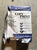 Torn wrapper Weyerhaeuser Copy Print 500-sheet paper ream 20 lb 8.5x11