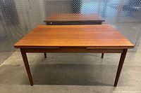 Full front view of teak dining table