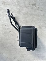 side view of hard case attached to bike rack frame