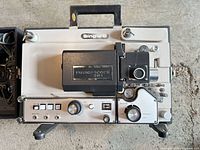 Front and top view of Fujicascope SMT projector showing controls and film path