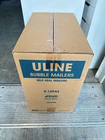 Front view of sealed Uline box labeled S-13944 #DVD 7.5 x 10.5 in 100/case
