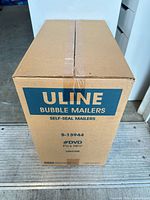 Sealed Uline case labeled S-13944 #DVD 7¼ x 10½ 100/Case