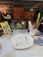 Group of mixed vintage kitchen items on countertop