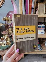 Front cover of paperback showing title, author and series logo