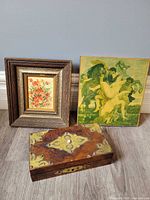 All three items: framed floral print, mythological print on board, burl wood inlaid box closed