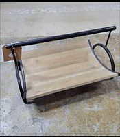 full view of wood slat cradle with metal frame