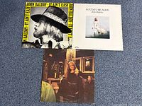 Front covers of all three albums