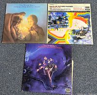 Front view of all three album covers