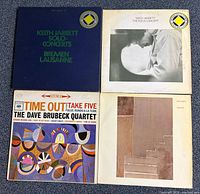 Group shot of all four vinyl album jackets