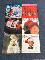 All six Christmas vinyl albums laid out