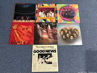 All seven Sweet Honey in the Rock LPs laid out on floor