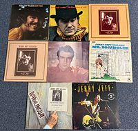 All eight album fronts laid out