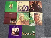 Group shot of all eight album covers laid out