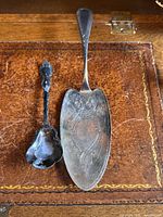 Pie server and spoon side by side