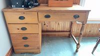 Full view of pine desk with drawers and organizer on top
