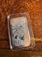 Obverse of silver bar showing Skylab 1973 design