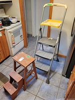 Overall view of both ladders in kitchen setting