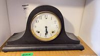 Full view of Sessions mantel clock on shelf
